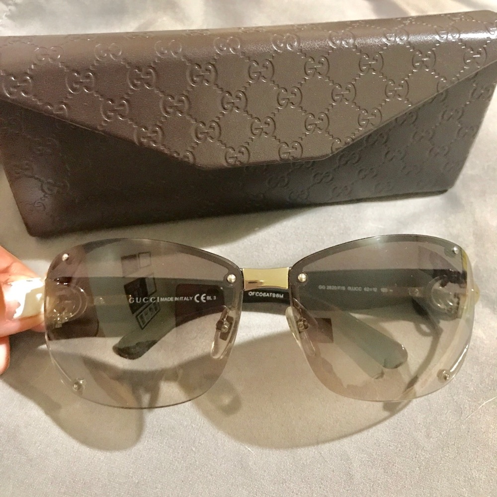 Gucci Sunglasses with case. PRICE FIRM